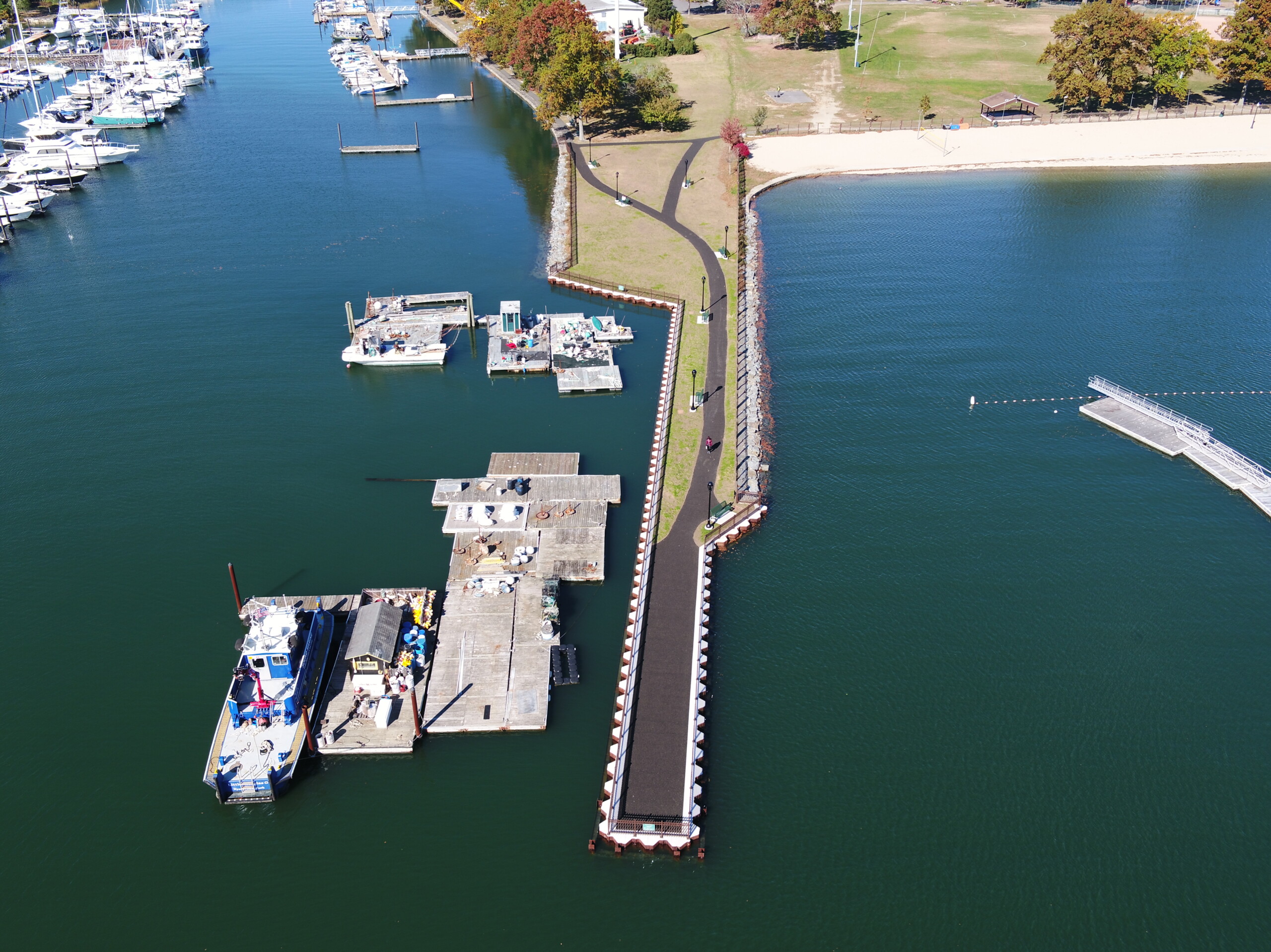(PHOTO: The Mamaroneck Wastewater Treatment Plant relies on a 60-inch diameter outfall pipe extending approximately half a mile into the Sound. Located in Harbor Island Park, the plant's outfall pipe runs along this jetty out into the Long Island Sound. Source: Westchester County.)