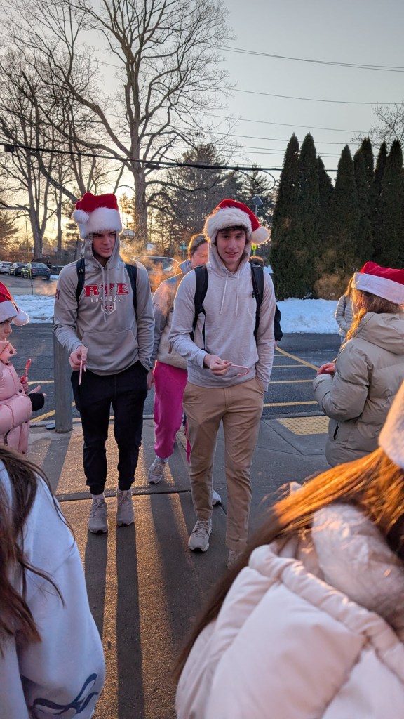 (PHOTO: The annual Candy Cane Express at Rye High School on Thursday on December 18th, 2025 had elementary school students from Midland, Milton, and Osborn handing out candy canes to high schoolers as they entered the building. Contributed.)