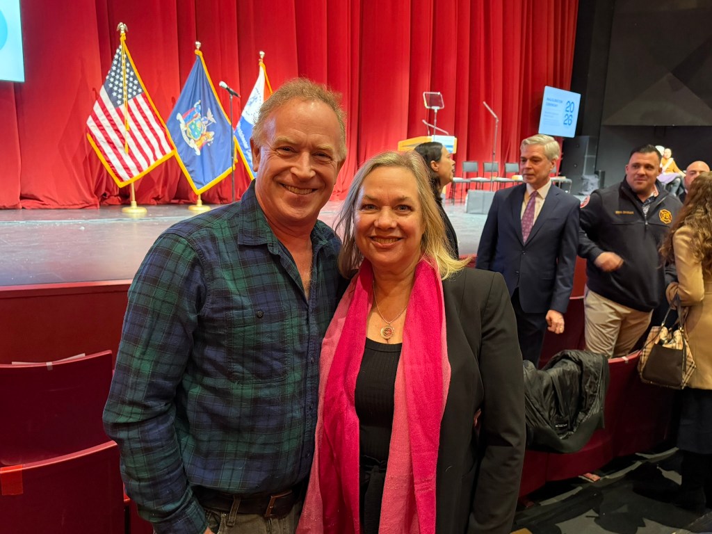 (PHOTO: Rye resident and former County Legislator Catherine Parker with her husband David Walker on January 1, 2026 at the Westchester County inauguration event at SUNY Purchase. January 8, 2026 will be proclaimed Catherine Parker Day in the City of Rye.)