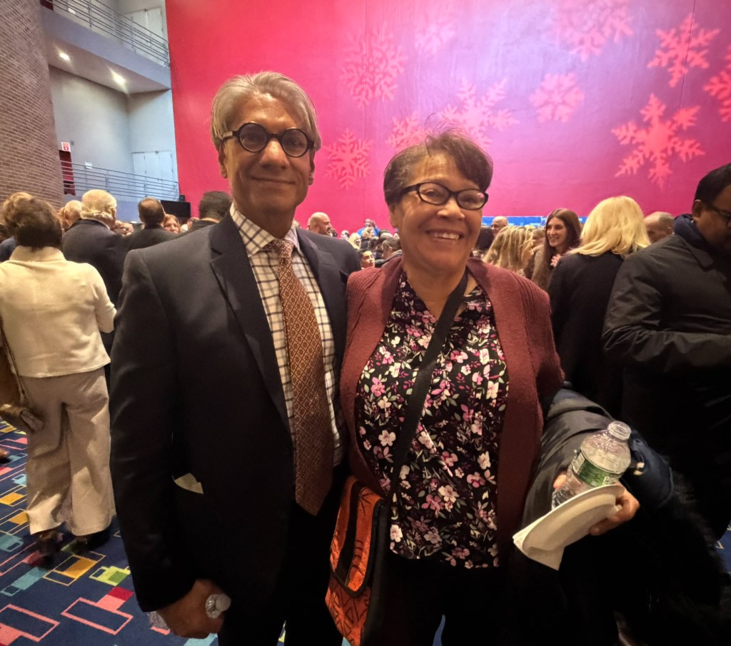(PHOTO: Rye's new County Legislator Anant Nambiar (District 7) with new Rye City Council member Marion Anderson at the County inauguration event on January 1, 2026 at the Performing Art Center at Purchase College.)