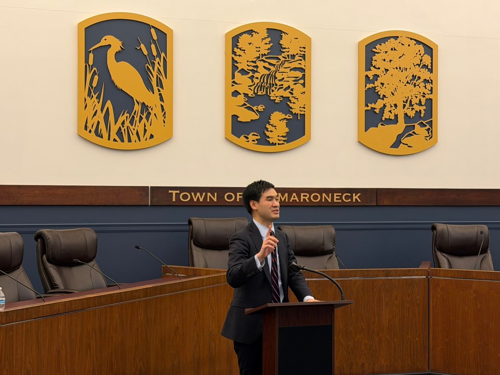 (PHOTO: Westchester County Legislator David Imamura (District 12) speaking at the swearing in of County Legislator Anant Nambiar, representing District 7 including the City of Rye, on January 8, 2026 at the Mamaroneck Village Courthouse.)