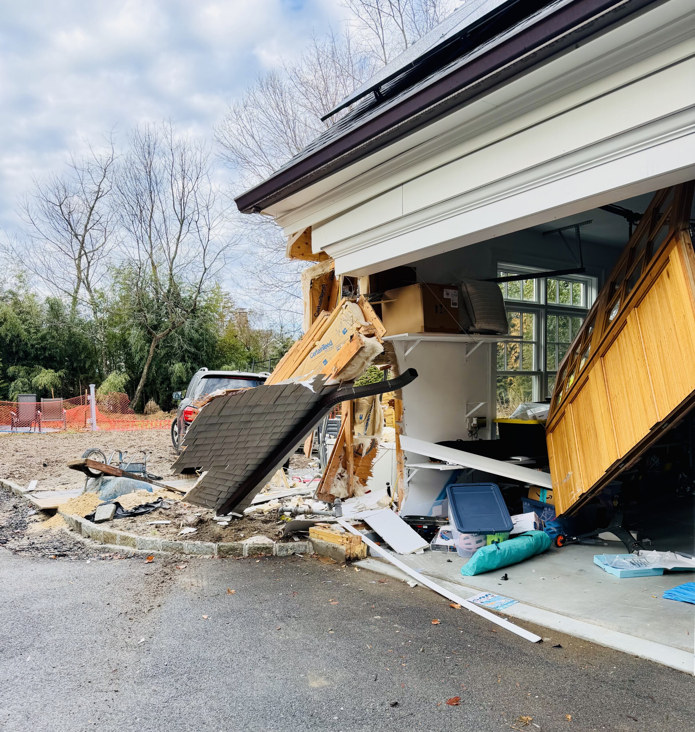 (PHOTO: A vehicle struck the house at 351 Park Avenue on Sunday, January 11, 2026 hard enough to remove a corner of the garage, threatening the structural integrity of the building. Rye FD and FD and New Rochelle FD responded to the scene. There were no reported injuries. Source: Rye FD.)