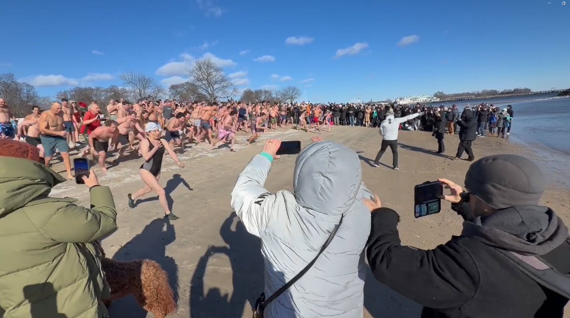 (PHOTO: 203 people participated in the 26th annual Polar Plunge at Oakland Beach in Rye on Thursday, January 1, 2026. The event money for local charities Soul Ryeders and Meals on Main Street. Contributed.)