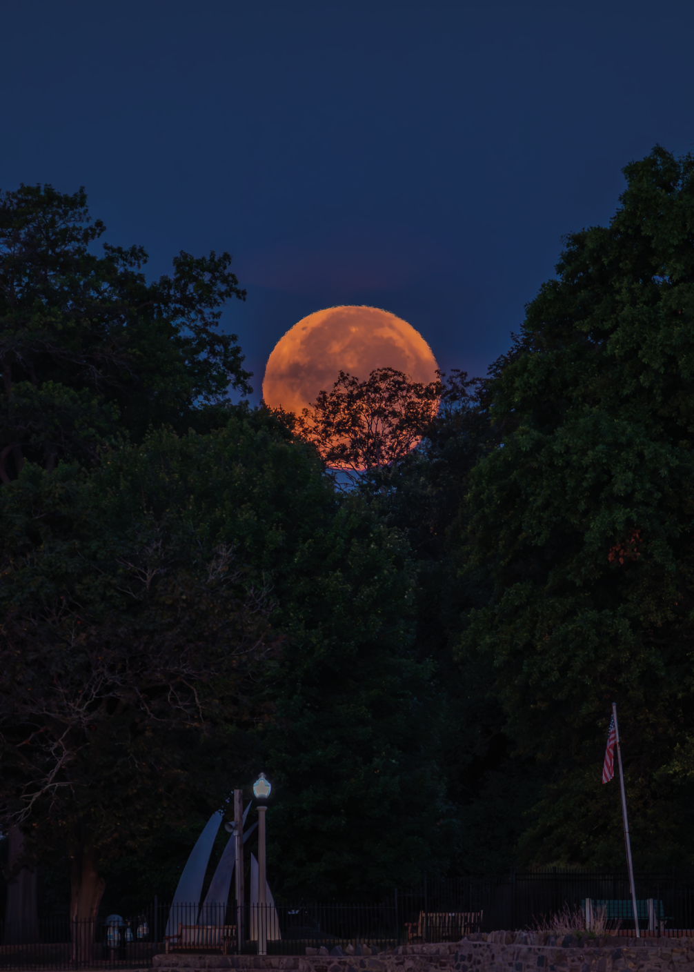 (PHOTO: Blood Moon. The crimson colored moon dominated the sky over Rye Town Park. By Stacey Massey, author of First Light, Rye.)