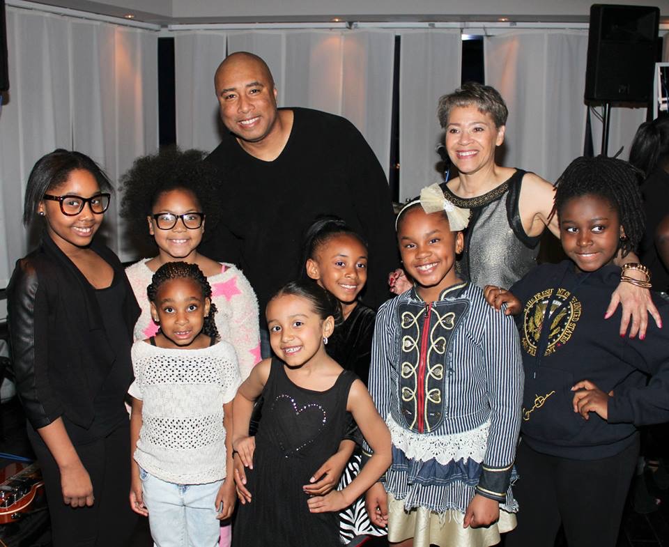(PHOTO: Heartsong, Inc. fundraiser in White Plains, NY in 2014. Standing in back: NY Yankee Bernie Williams and  Marion Anderson with child models. Contributed.)