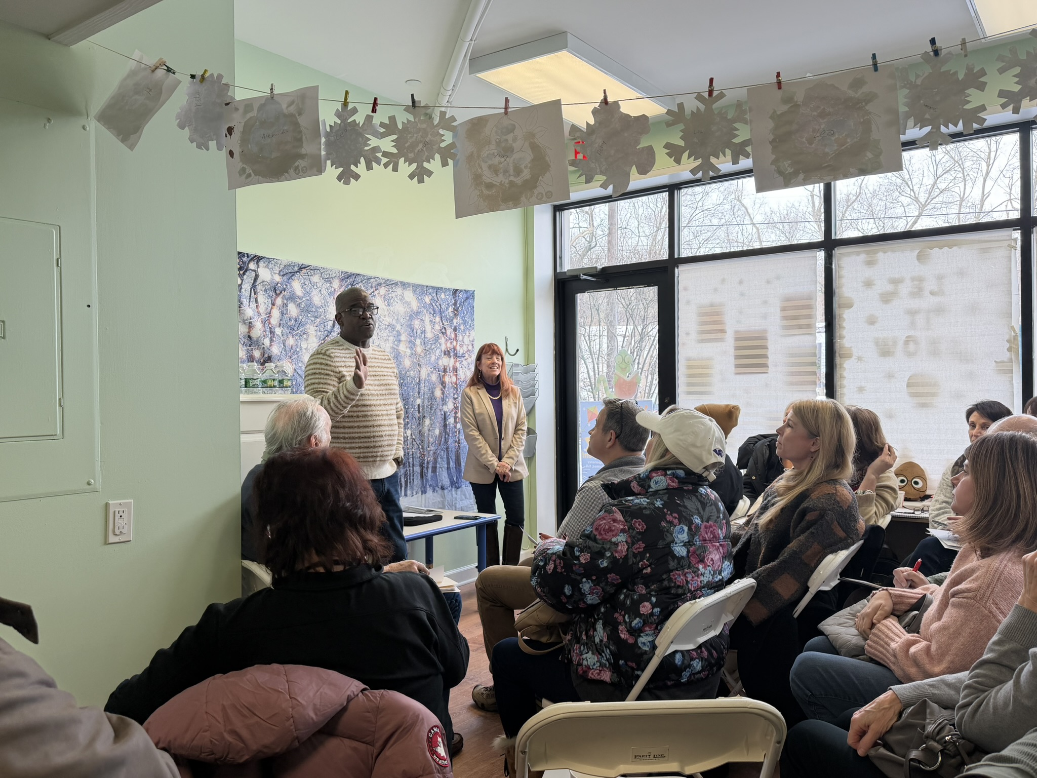 (PHOTO: Westchester County Executive Ken Jenkins and Robin Latimer, the chair of the new Friends of Rye Playland group, speak with attendees at the group's inaugural meeting on Saturday, February 7, 2026.)