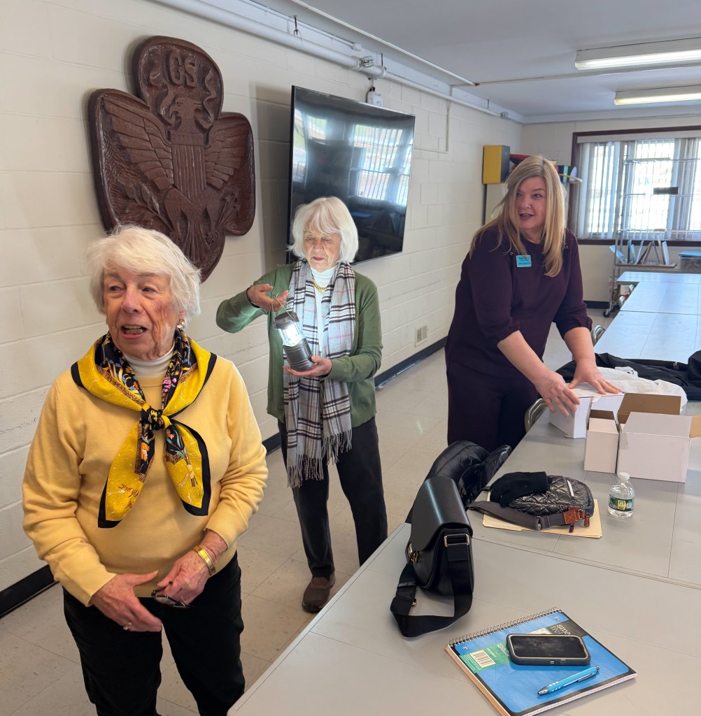 (PHOTO: Rye Senior Advocacy Committee members Nancy Haneman (co-chair), Barbara Brunner (with the lantern) and Michele Thomas (co-chair).)