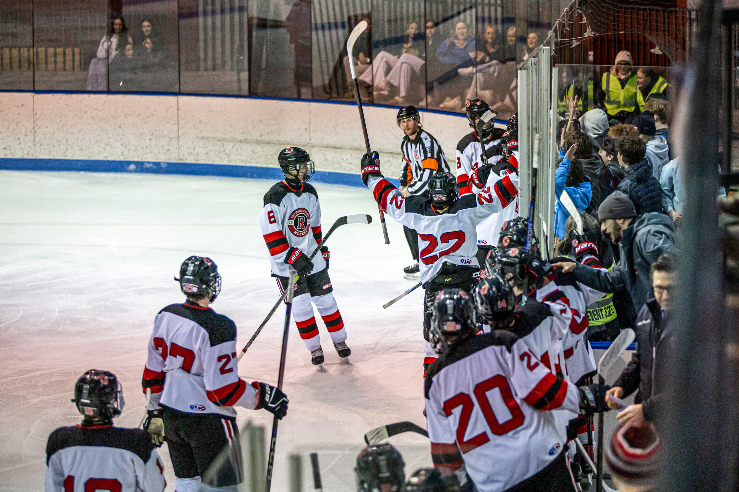 (PHOTO: The Rye Hockey team celebrating a goal from February 4, 2026. Credit: Maureen Tsuchida.)