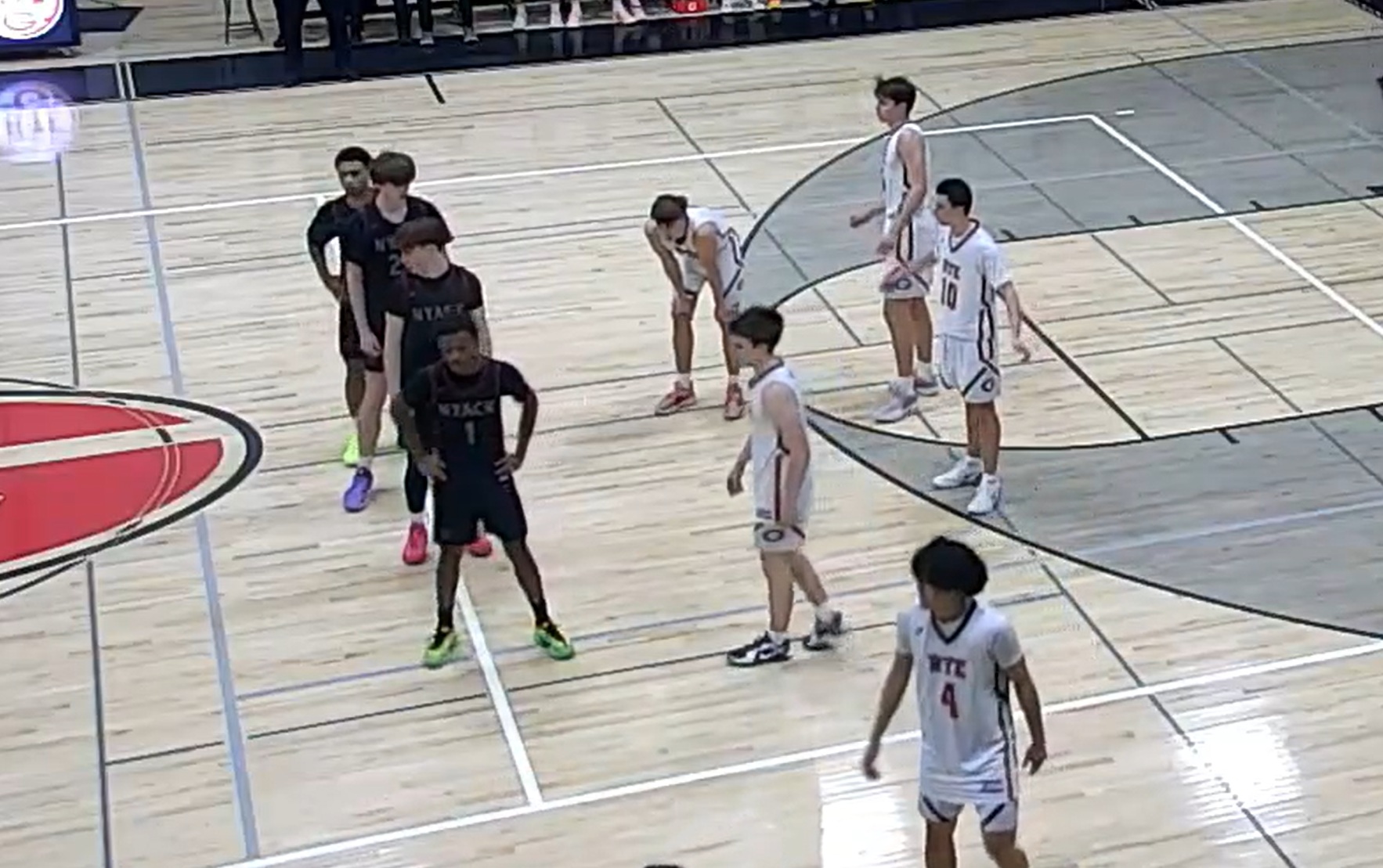 (PHOTO: The Rye Boys Basketball team defending an inbound pass against Nyack in a win on February 2, 2026.)