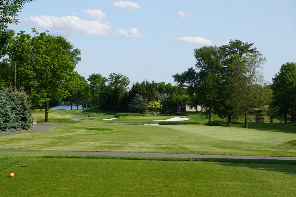 (PHOTO: The 12th hole tee box at Rye Golf Club. The club is rolling out eletric robotic lawnmowers. Credit: Will Kressler.)
