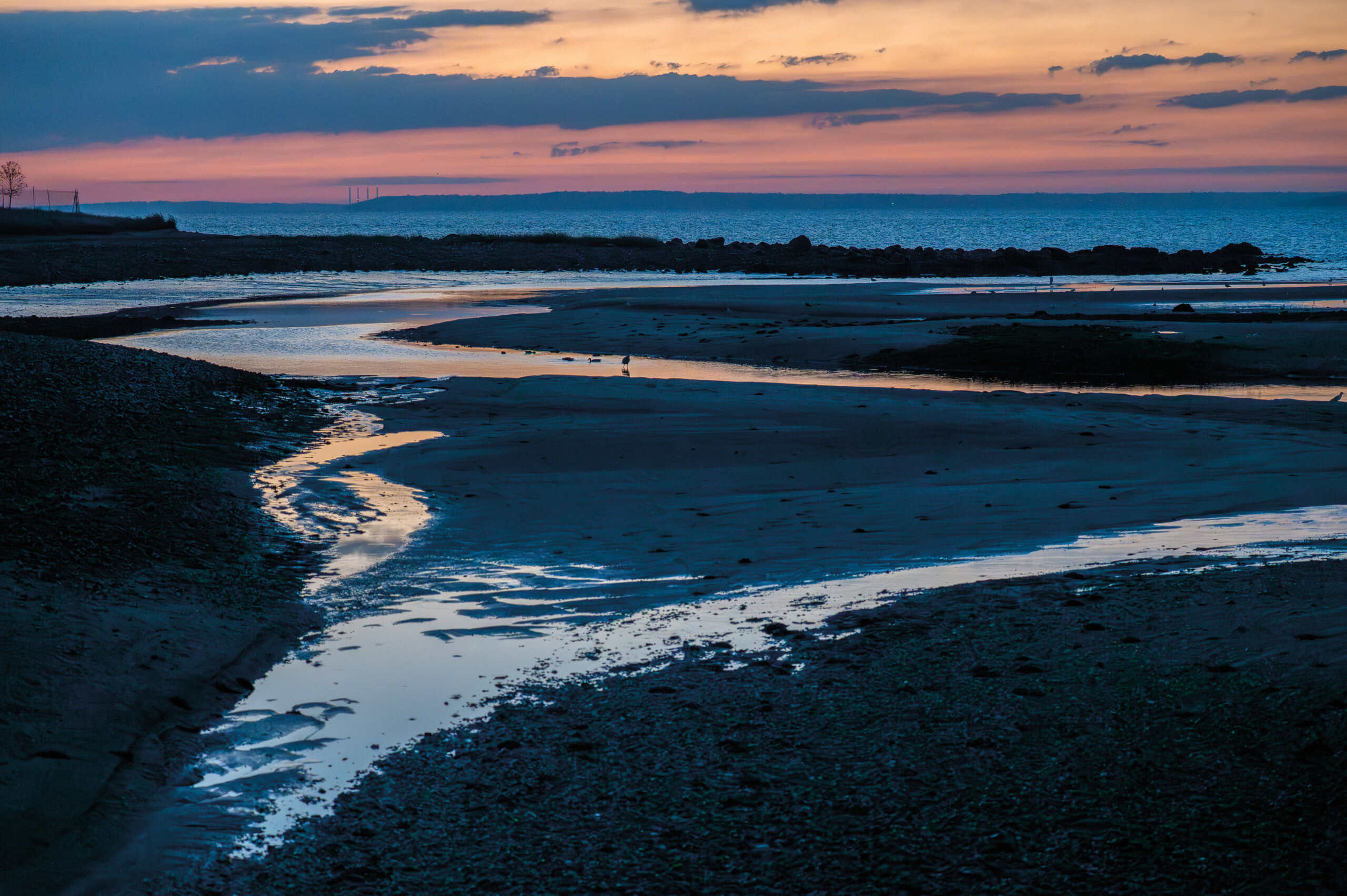 (PHOTO: Tidal Pools. At the end of the Playland Boardwalk tidal pools form along the coast. By Stacey Massey, author of First Light, Rye.)