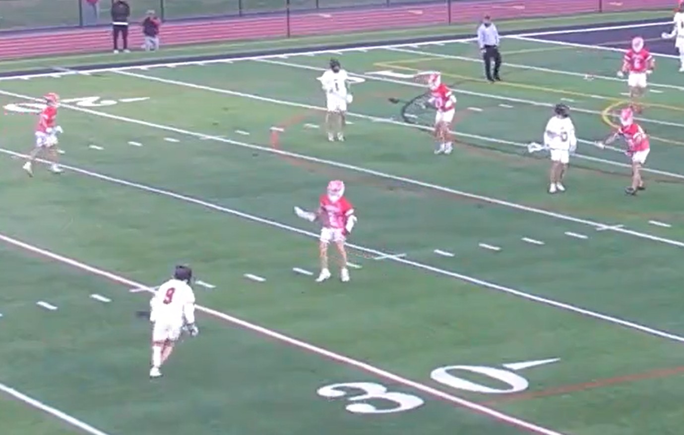 (PHOTO: The Rye Boys Lacrosse team on offense against Somers on March 28, 2026.)