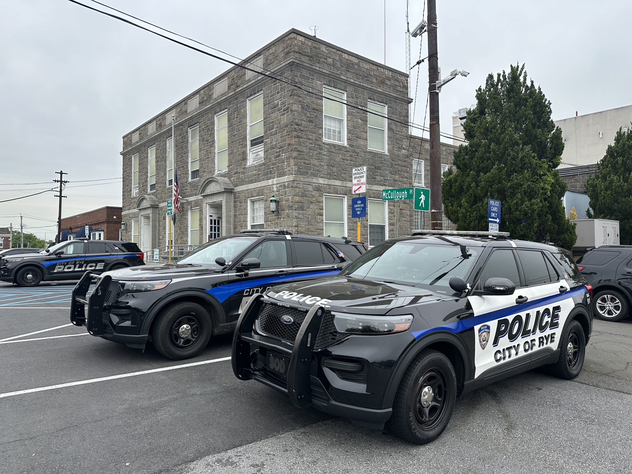 (PHOTO: Police vehicles in front of the Rye Police Department headquarters. File photo. 2025. Credit: Jackson Beatty.)