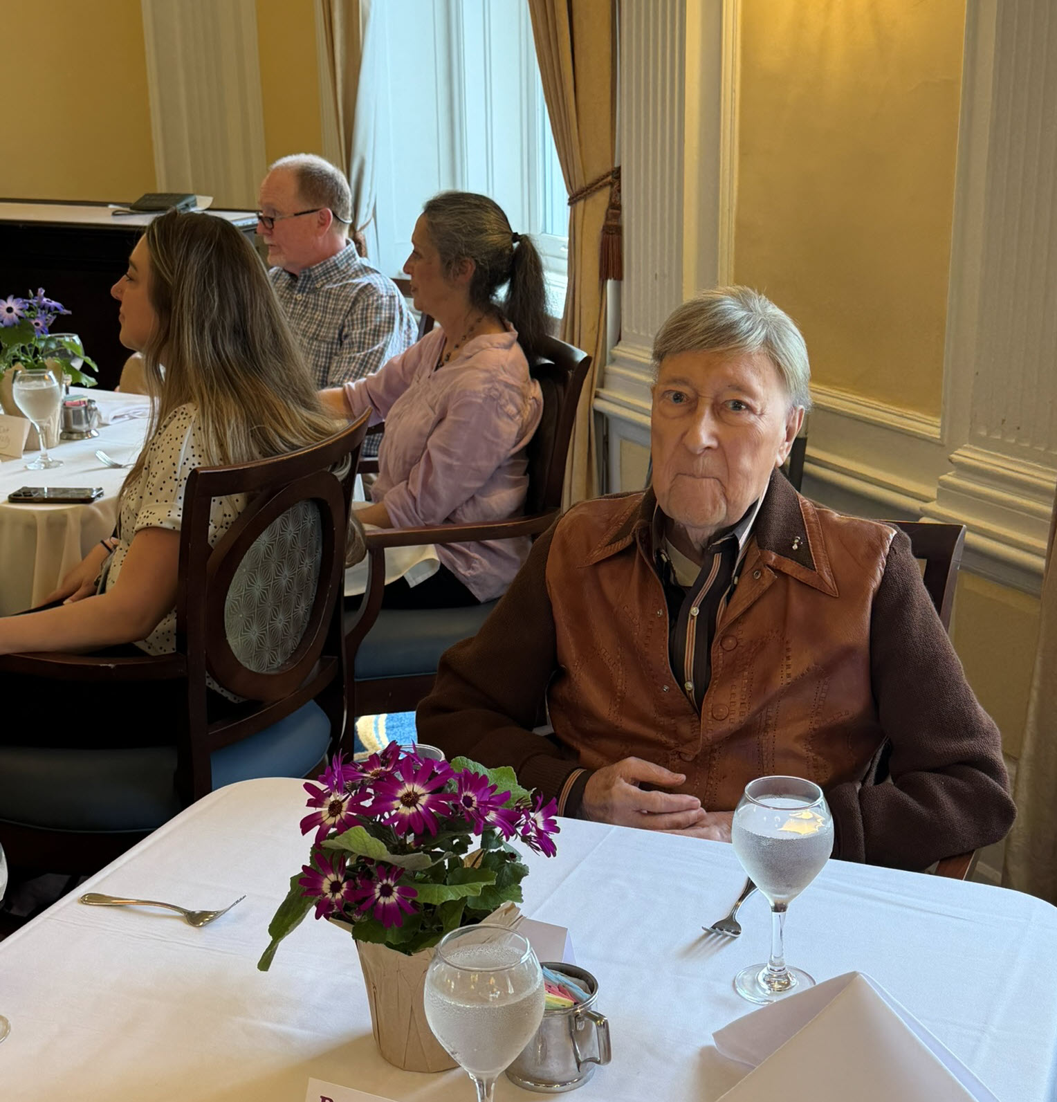 (PHOTO: Osborn resident Dr. Ed Pasciuti, age 99, at the centenarian lunch on April 16, 2026.)