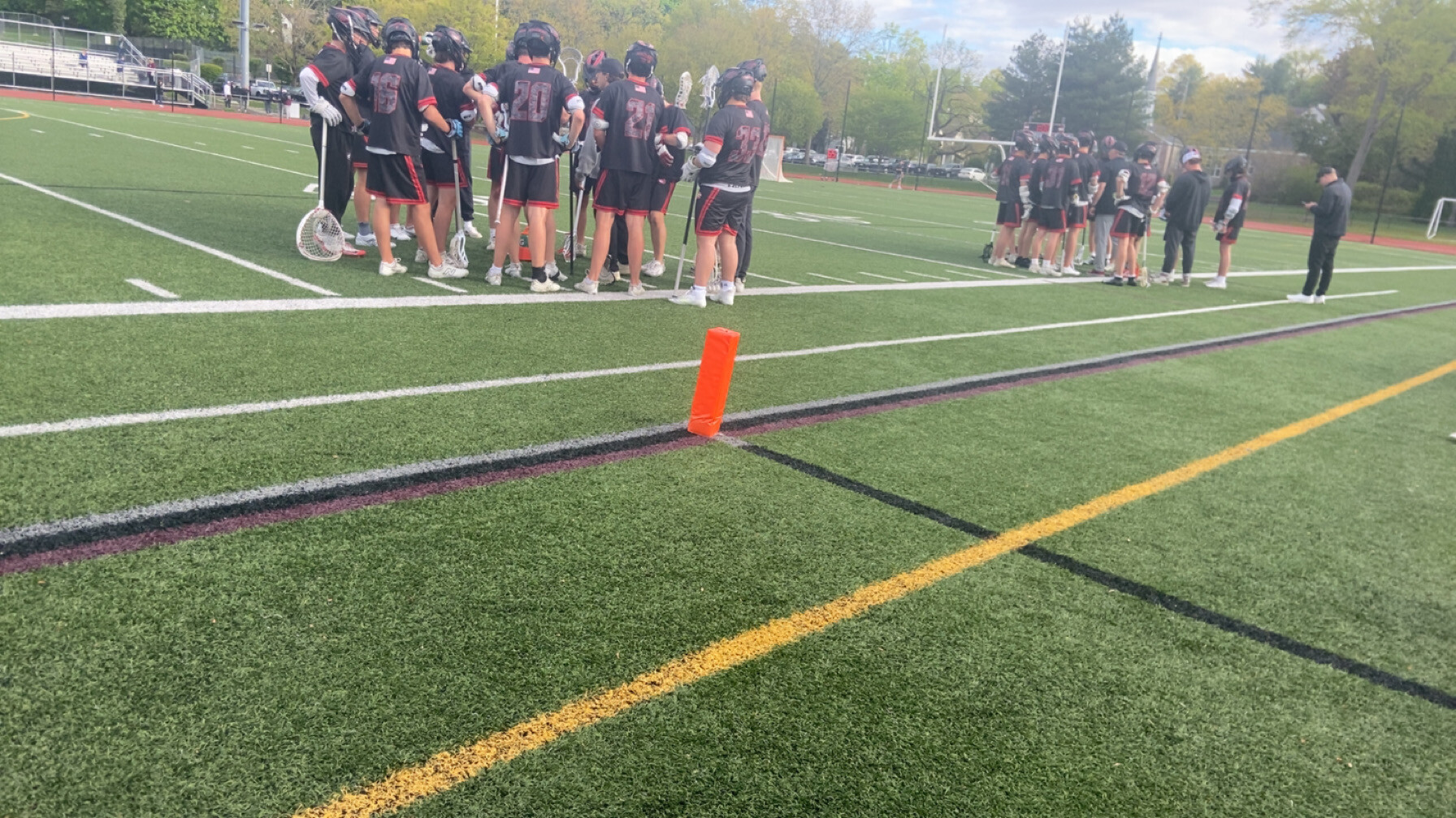 (PHOTO: The Rye Boys Lacrosse team in a huddle on April 30, 2026. Contributed.)