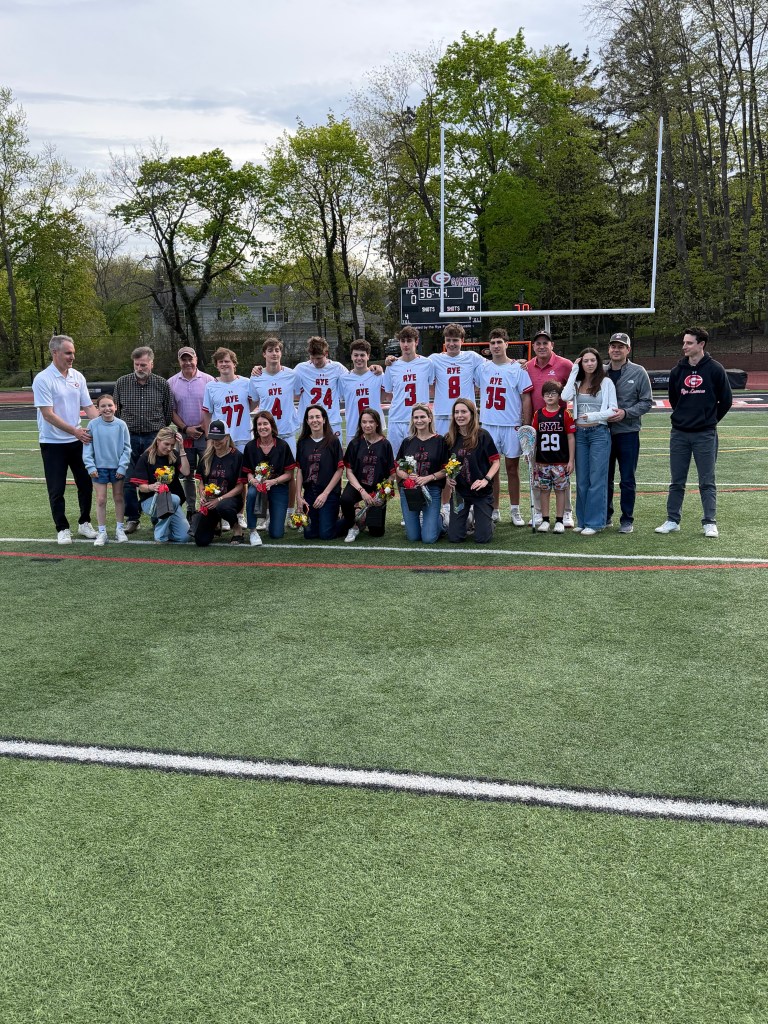 (PHOTO: The 2026 Rye Boys Lacrosse seniors and their parents from April 23, 2026. Contributed.)