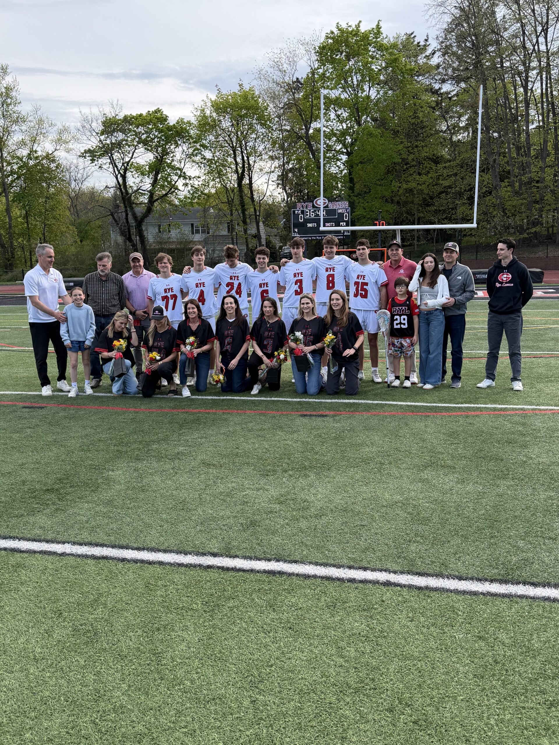 (PHOTO: The 2026 Rye Boys Lacrosse seniors and their parents from April 23, 2026. Contributed.)