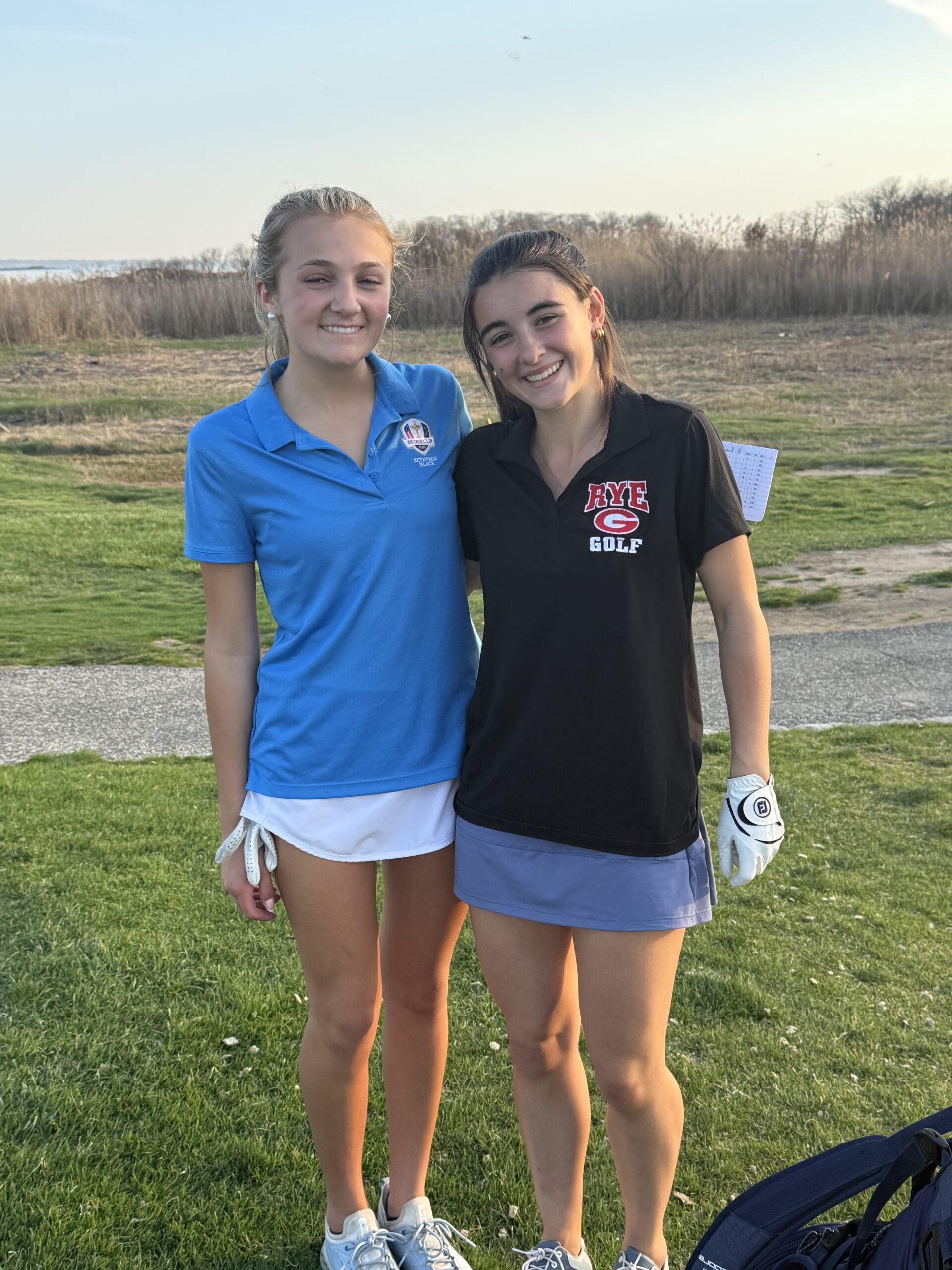 (PHOTO: Anna Bancroft (left) and Iciar Garate (right) of the Rye Girls Golf team on April 16, 2026. Contributed.)