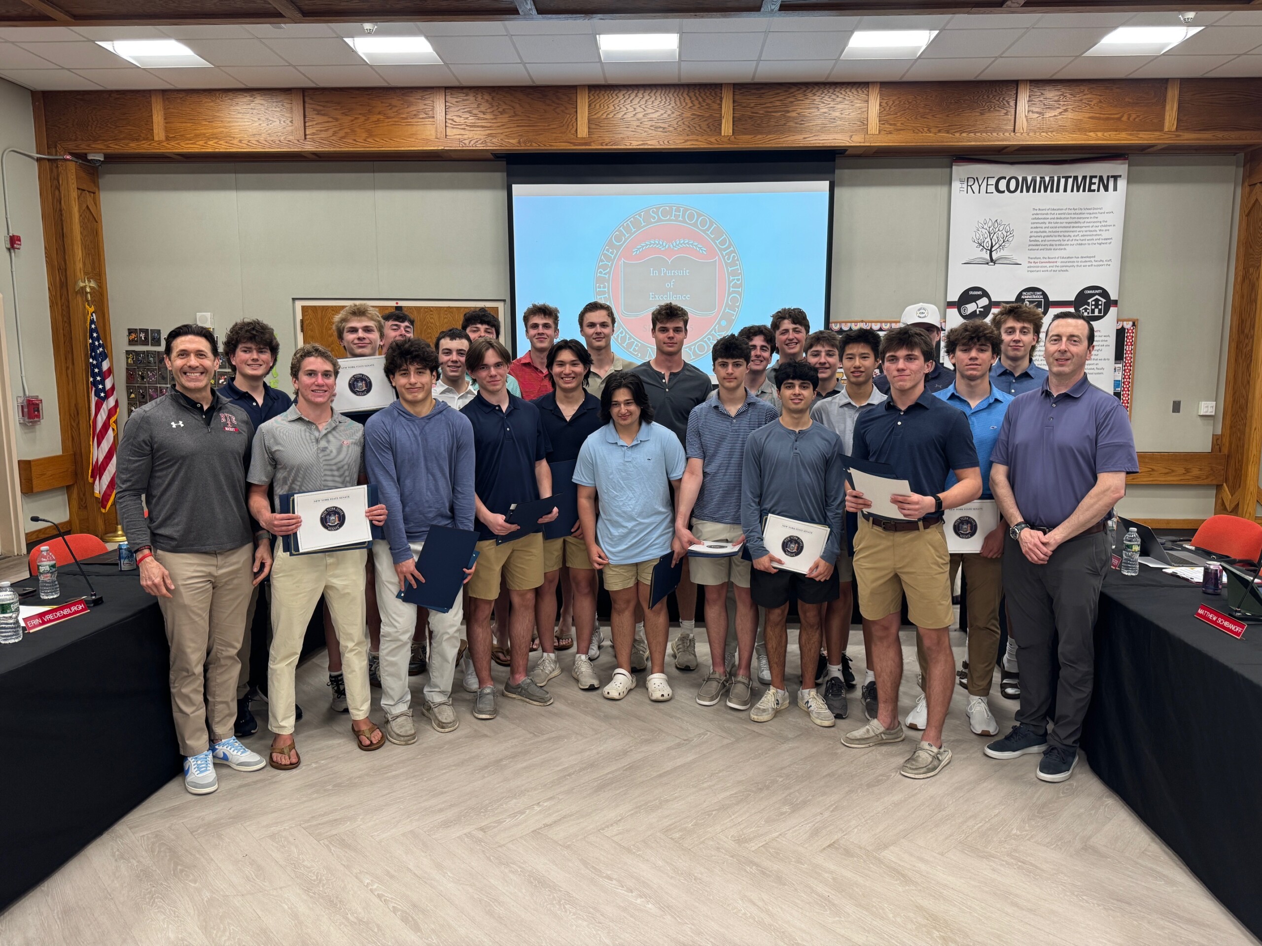 (PHOTO: Members of the Rye Varsity Hockey team being honored at the Board of Education meeting on April 14, 2026.)