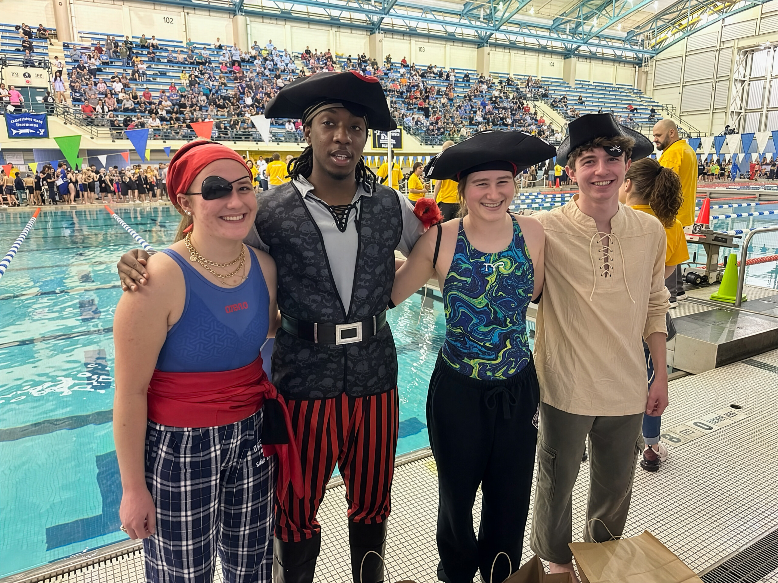 (PHOTO: The four WaveRyeder Swim team seniors. Kiera Palmer, Gianmarco Miraglia, Ella Godden, and Alex Pinnock. Contributed.)