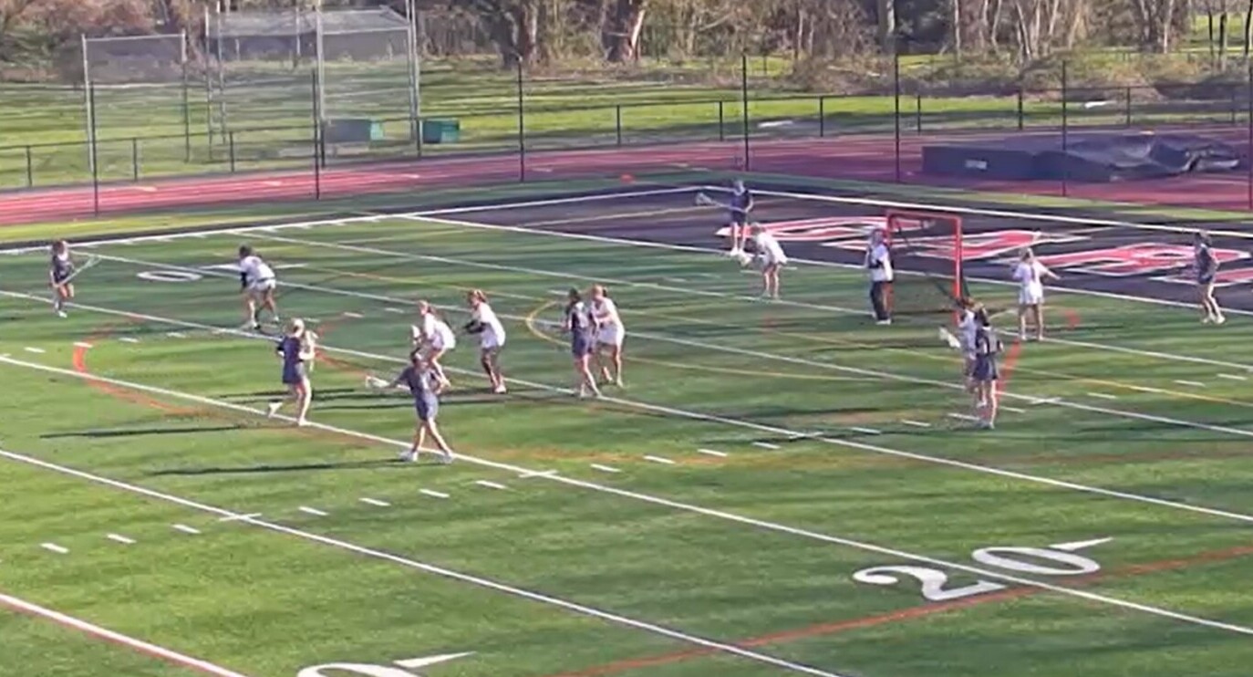 (PHOTO: The Rye Girls Lacrosse team defending against Wilton on April 7, 2026.)