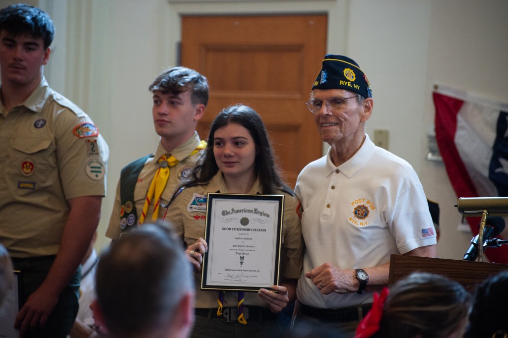 Eagle Scout receiving award.