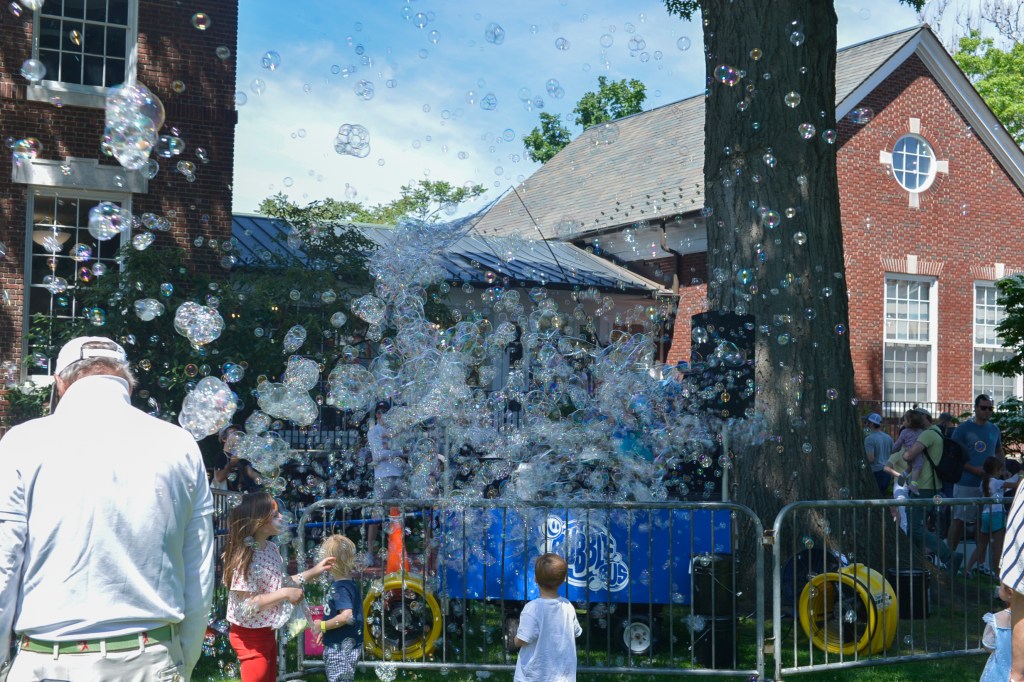 (PHOTO: The Bubble bus set the atmosphere of the Vehicle Fair with lively music and bubbles. Credit: Claire Hovers.)