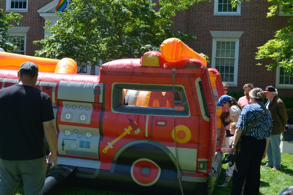 (PHOTO: The firetruck themed inflatable obstacle course at the Vehicle Fair. Credit: Claire Hovers.)