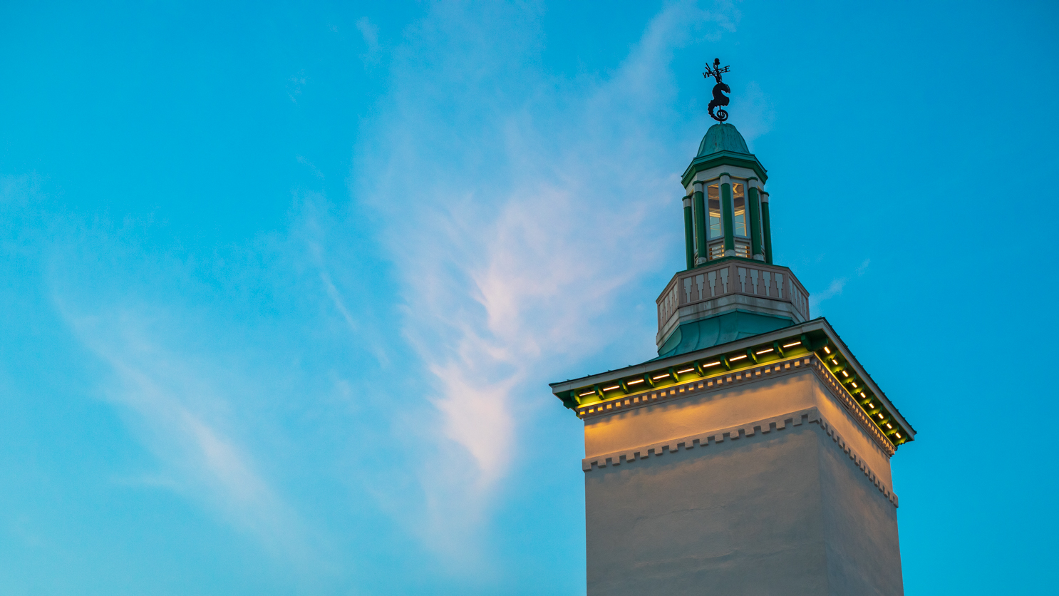 (PHOTO: South Tower and Summer Cirrus, the Bathhouse at Playland Park. By Christine Gregg.)