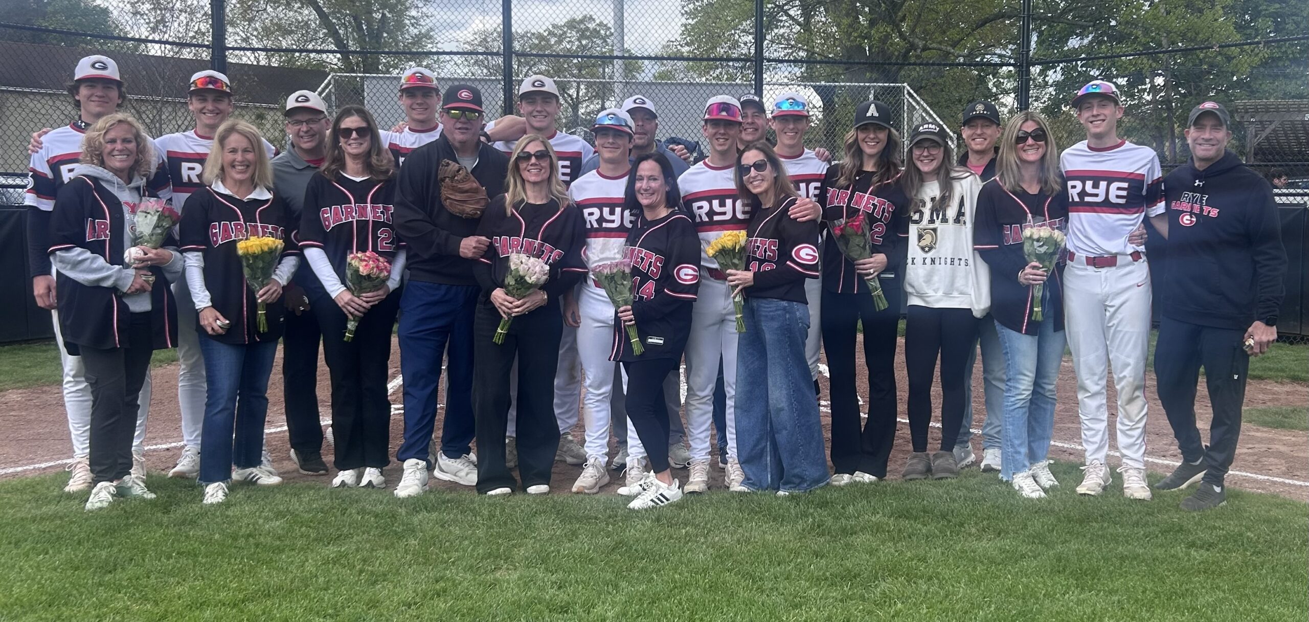 (PHOTO: The 2026 rye Baseball seniors and their parents. Contributed.)