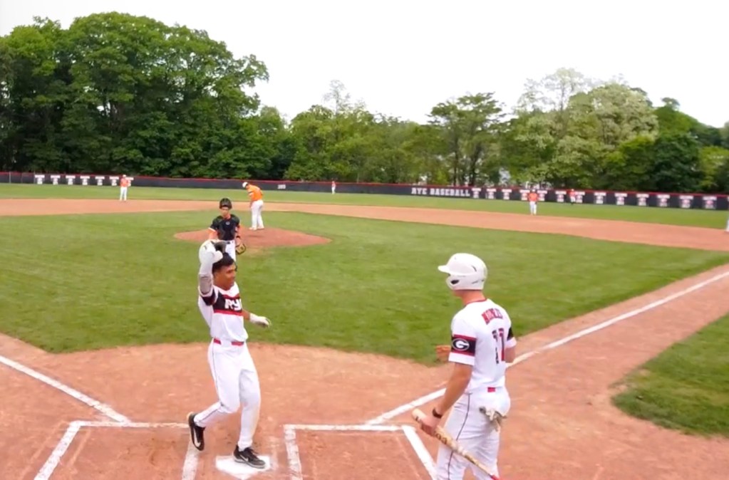 (PHOTO: Rye Baseball’s Luke Ontaneda (left) after a home run in a playoff win on May 22, 2026. Credit: GameChanger.)