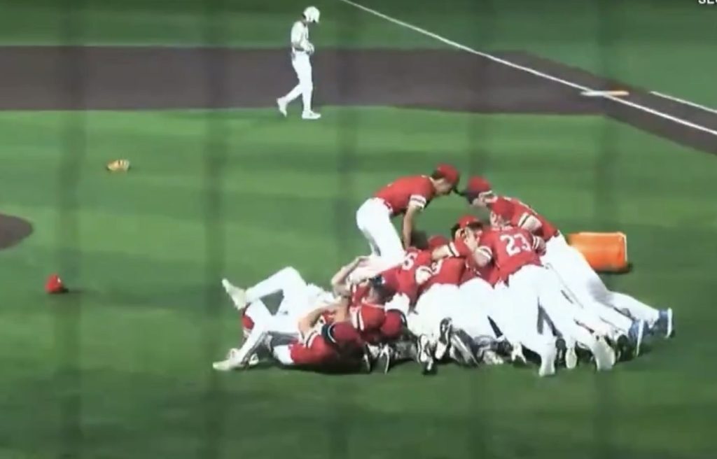 (PHOTO: The Rye Baseball team dogpiling to celebrate their Section 1 championship on May 31, 2026. Credit: SportsEngine.)