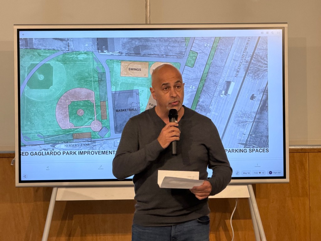 resident speaking at a public meeting