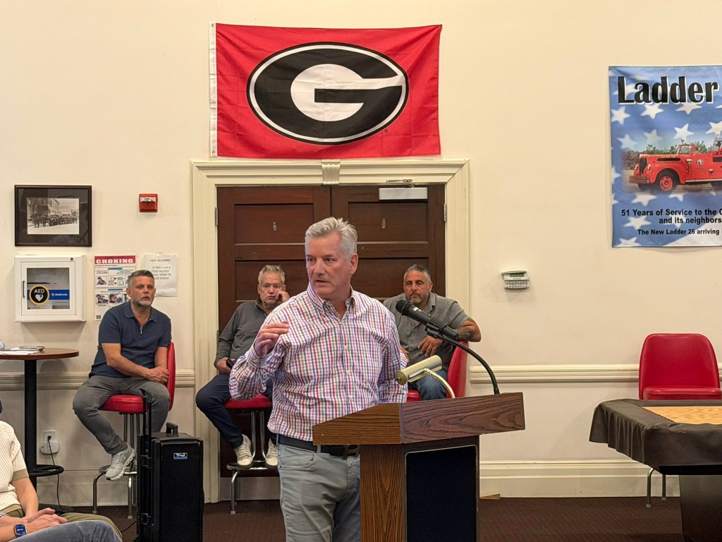 Speaker at public meeting