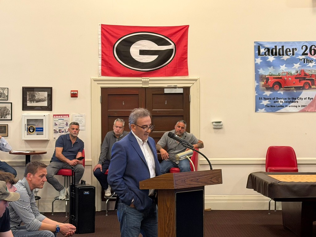 Speaker at public meeting.