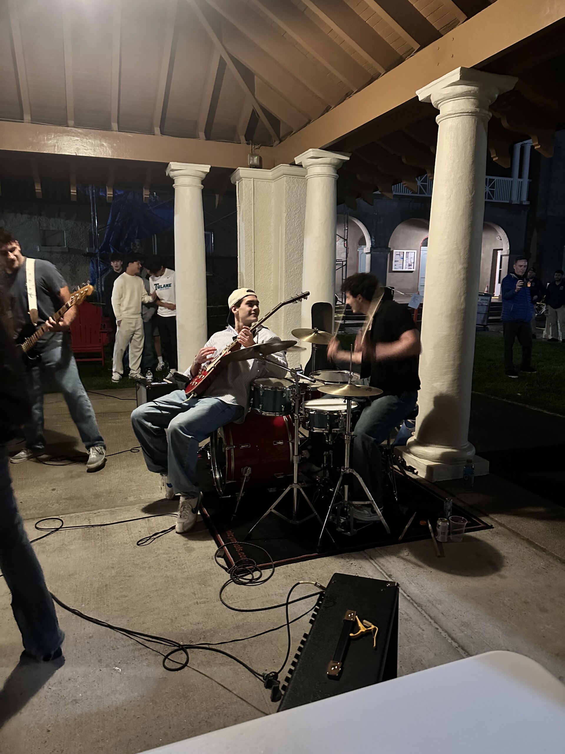 (PHOTO: Gordon Hargraves (left, guitarist) and Jesse Stigliano (right, percussionist) from the Summer Project band performing at the Rye Rugby 'Scrum on the Sound' event on May 9, 2026. Contributed.)