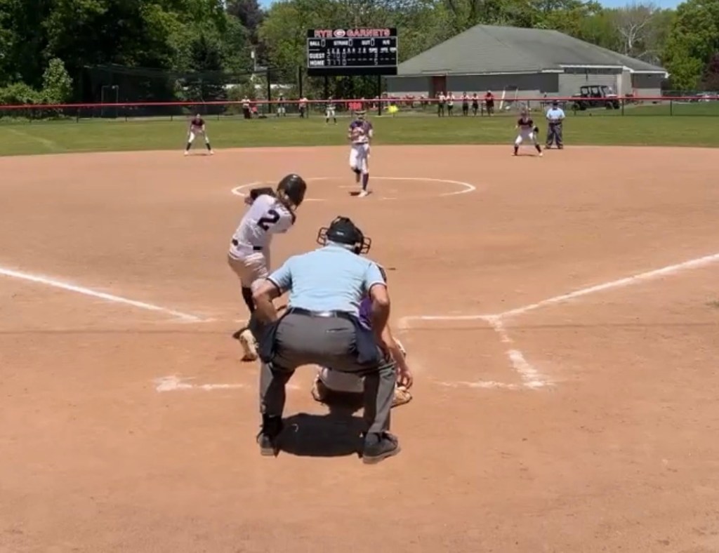 (PHOTO: Rye Softball's Penelope Gilmore (#2) lifting a double to right center field in a win on May 16, 2026. Credit: GameChanger.)