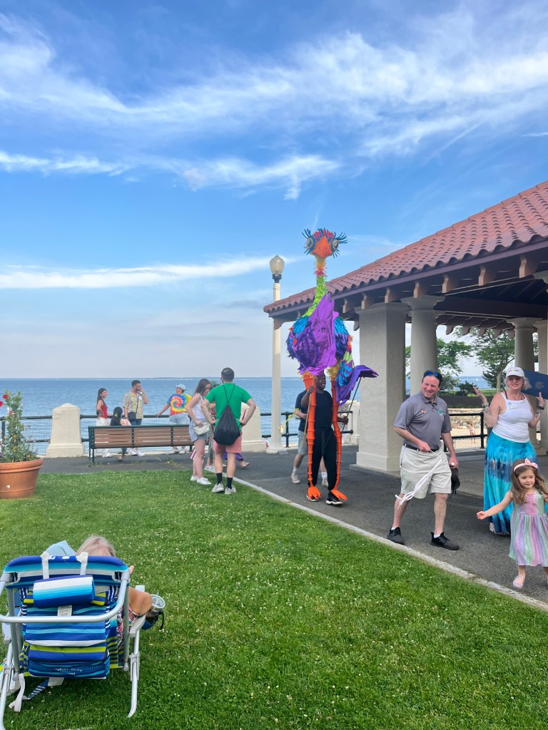 (PHOTO: The 2026 Pride month parade at Rye Town was led by colorful puppets. Credit: Claire Curran.)