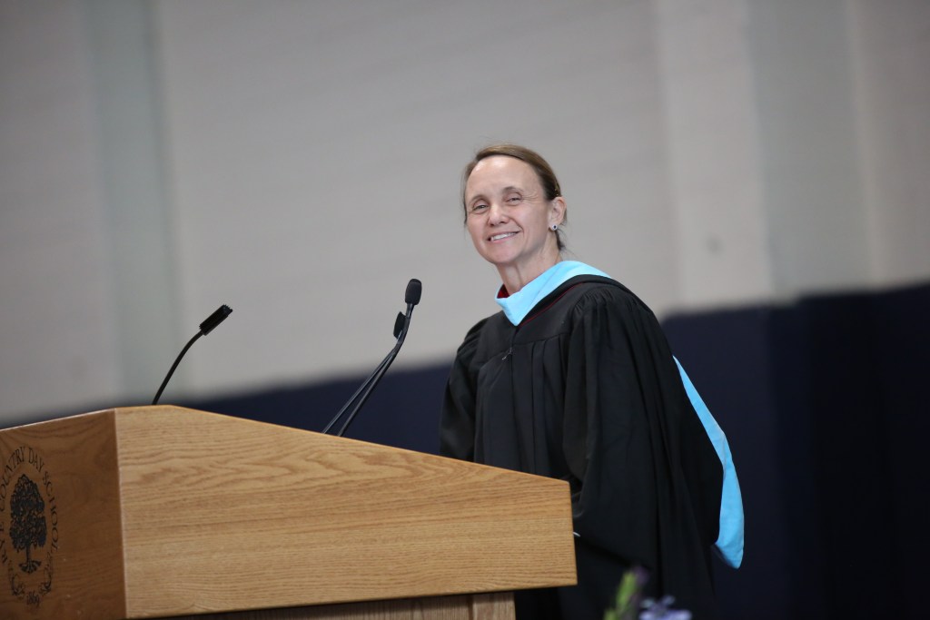 (PHOTO: Rye Country Day School's Upper School Principal Jenny Heath addressed the class of 2026 at their commencement on June 4, 2026. Credit: Bruce Gilbert.)