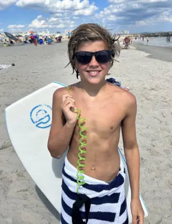 Photo of boy at the beach.