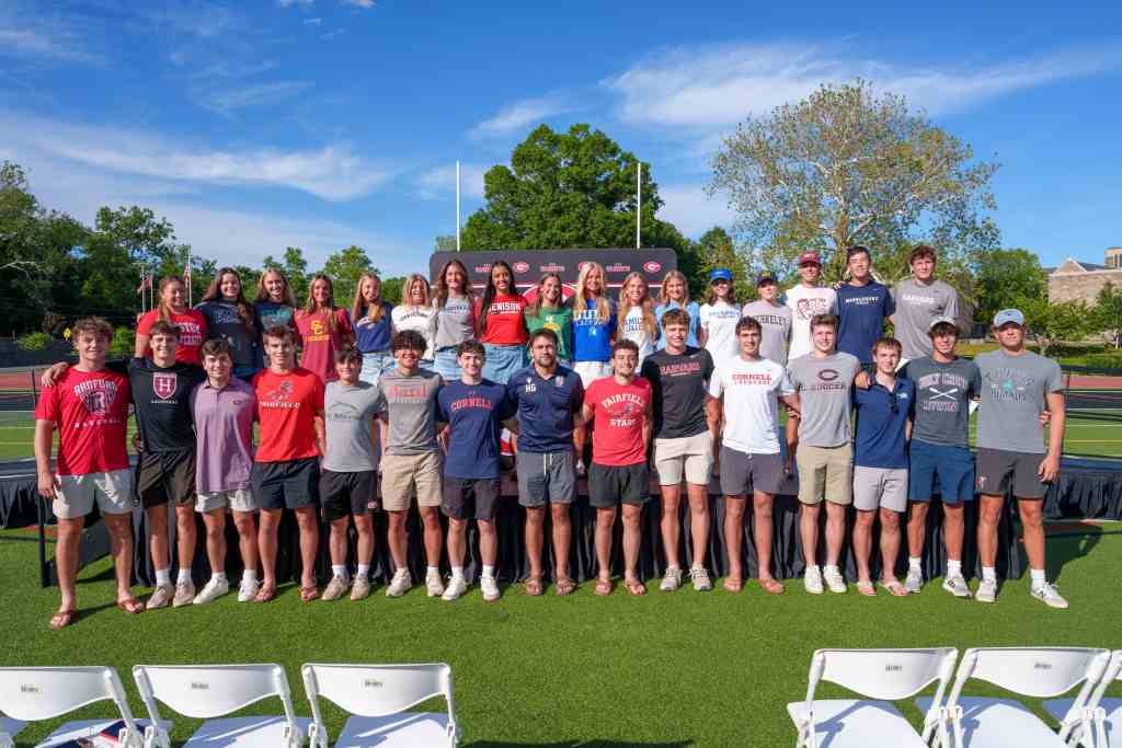 (PHOTO: The 33 Rye High School students from the Class of 2026 who signed to play collegiate athletics on June 16, 2026. Credit: Rye City School District.)
