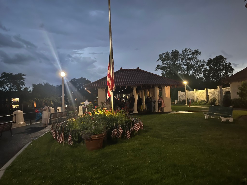 (PHOTO: Crowds took cover watching the lightning on July 4th, 2026 awaiting the firework show. Credit: Max An.)
