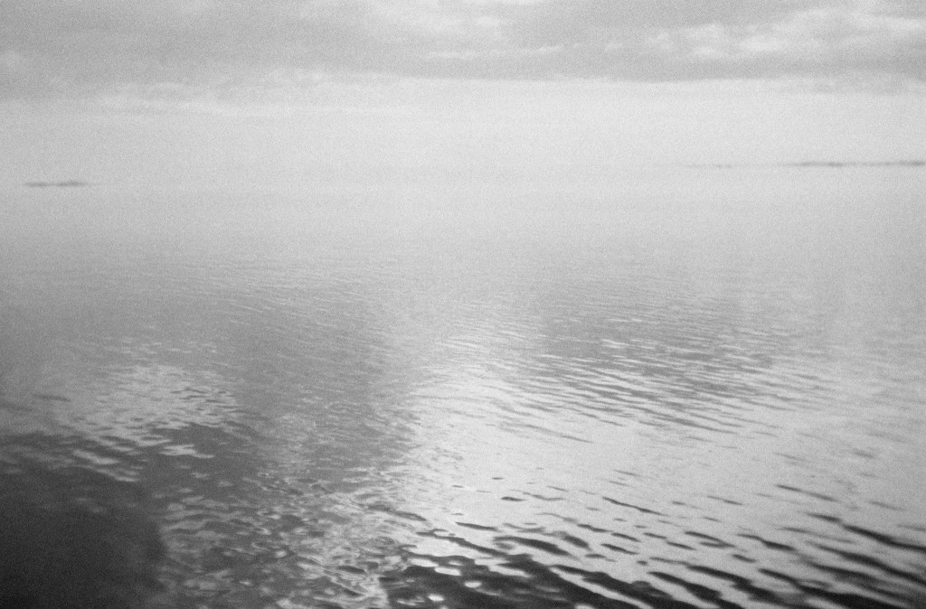 (PHOTO: Foggy Mirror. Shrouded with fog the water becomes indistinguishable from the sky. By Markus Peters.)