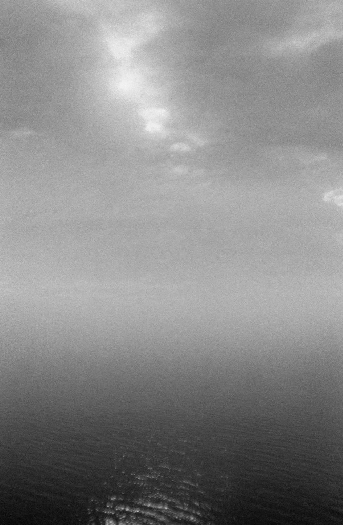 (PHOTO: Gradient of Fog. The mist across the water blends the sea and sky. By Markus Peters.)