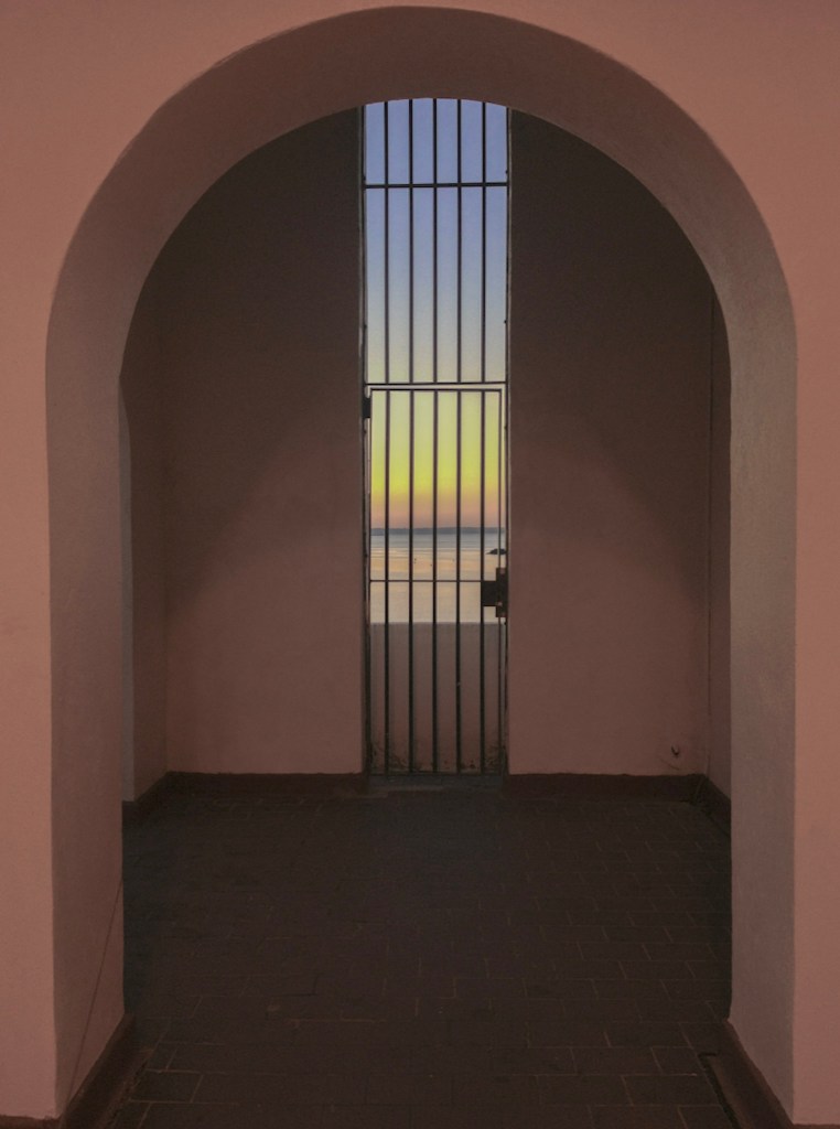 (PHOTO: Tower Views. The sunset seen through the tower over the Playland Baths. By Markus Peters.)