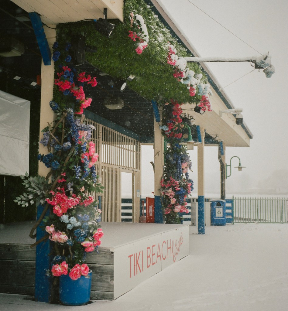 (PHOTO: Tropical Snow. The Tiki Bar on the Playland Boardwalk features tropical decor even in the snow. By Markus Peters.)