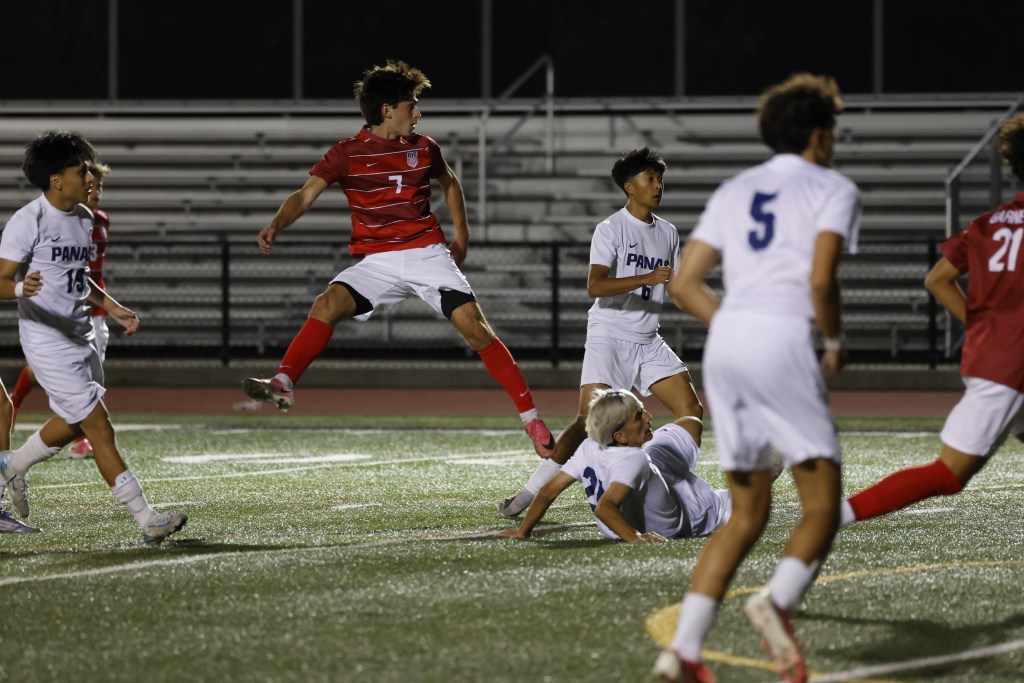 (PHOTO: Rye Boys Soccer's Kasen Scarperi (#7) from a four-goal performance on September 22, 2026. Credit: Alvar Lee.)