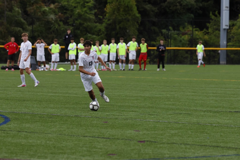(PHOTO: Rye Boys Soccer's Luka Rozende (#13) from September 28, 2026. Credit: Alvar Lee.)