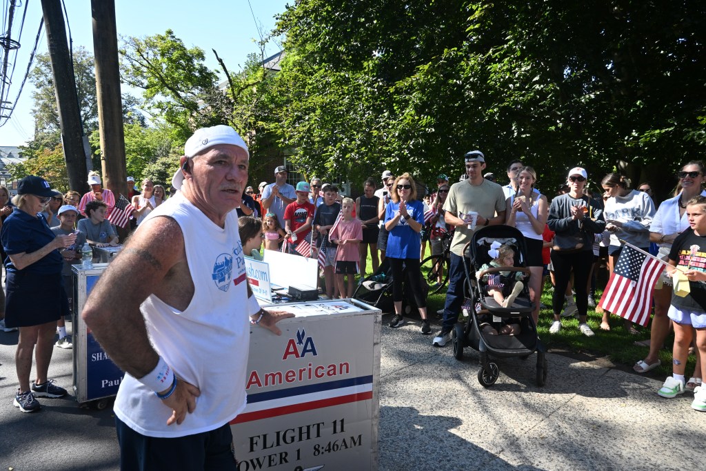 Man speaking to a crowd