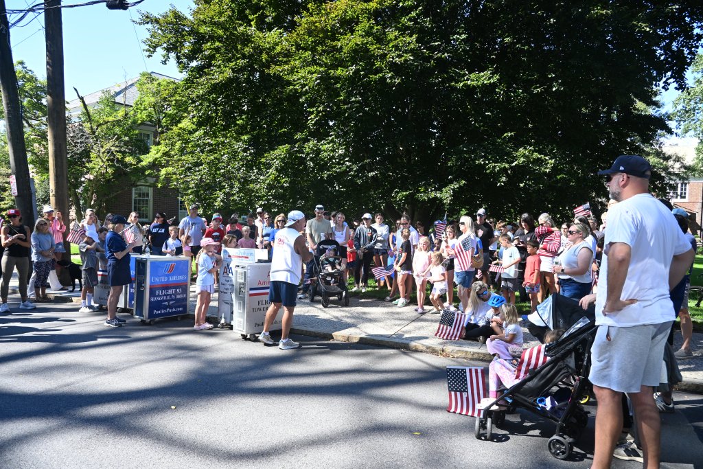 Man gathered in front of a crowd.